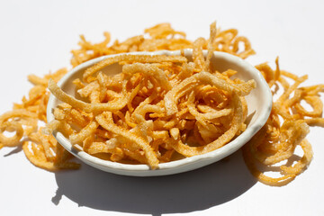Crispy pork rinds or pork snack.
