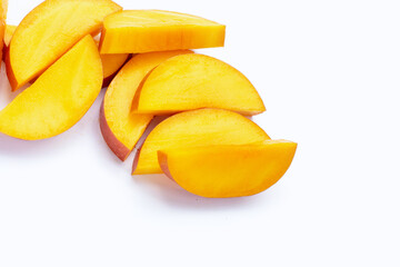 Naklejka na ściany i meble Mango fruit slices on white background.