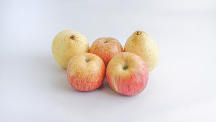 Apples and pears on a white background