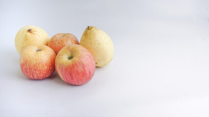 Apples and pears on a white background