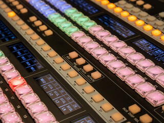 Concept Idea: Professional broadcast video mixer in tv studio as background