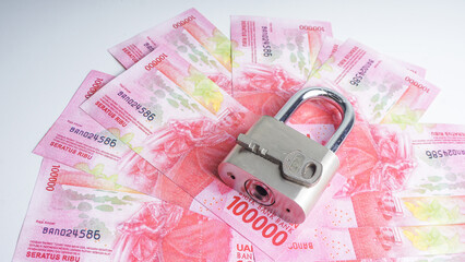 Indonesia Money Rupiah cash banknote and padlock, security of money concept