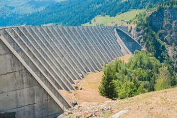 Dike of a large cement dam in the French Alps.