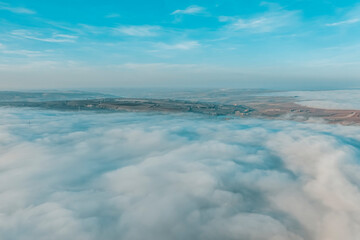 Top view of fog and high way, aerial photos of road and fog with sunset light and clouds