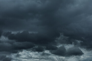 Beautiful view of sky covered with grey thunderclouds - obrazy, fototapety, plakaty
