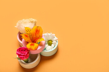 Composition with plaster podiums and flowers on color background