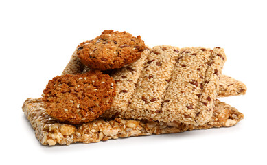 Heap of sesame kozinaki and cookies on white background