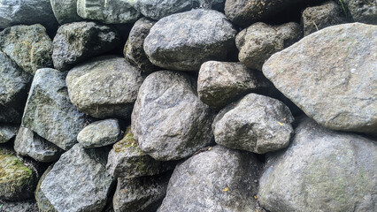 Background of black stone wall