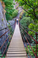 Naklejka premium Suspension bridge on the Monachil cahorros route. Grenade. Spain