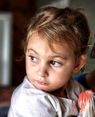 Portrait of a little girl staring at something