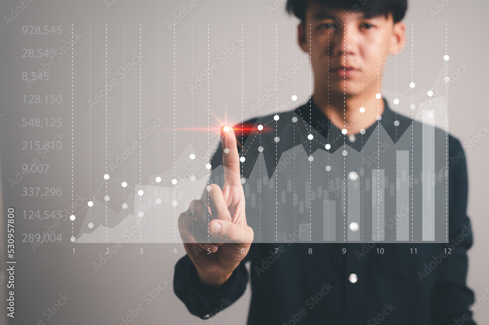 Poster man touching a holograph isolated on a grey background. business global internet connection applicat