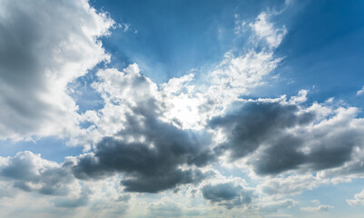 Blue sky and white clouds with sunshine natural background