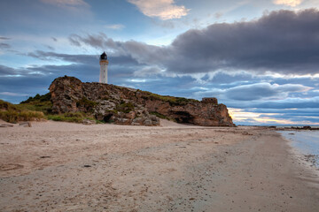 Covesea Skerries Lighthouse at sunset, Scotland.