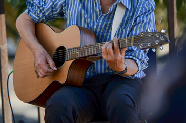 person playing guitar