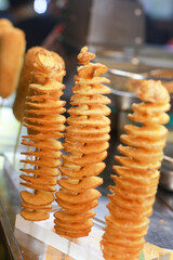 Spiral fried sweet potato in ho thi ky street, ho chi minh city, vietnam