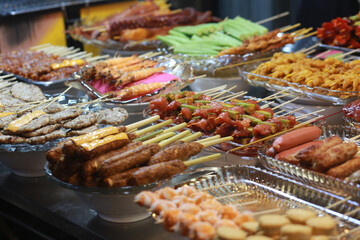 grilled dishes like pork, okra, beef, bell pepper in ho thi ky street food