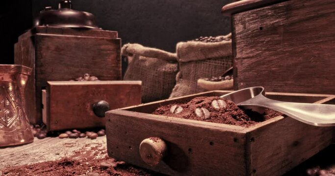 Milled coffee beans in bag and grinder with ground coffee