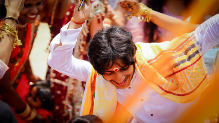 man dancing in indian cultural party