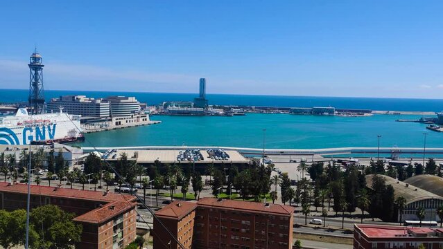 Barcelona cruise ship terminal port with city. View from hotel terrace in Spain. Sea view. Panning shot.
