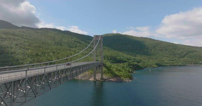 Car Driving Across Skjomen Bridge Spanning The Skjomen Fjord In Narvik, Nordland, Norway. - aerial