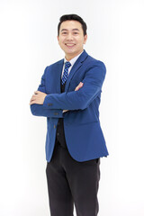 Millennial Asian smart handsome cheerful proud successful professional male businessman ceo entrepreneur in formal suit and necktie standing smiling posing crossed arms on white background