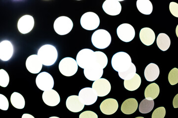 abstract blurred background of lights. Abstract blurry dark indoor plaza hall with a lot of small bokeh