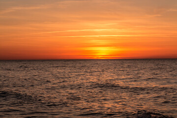 Fototapeta na wymiar Sunset on the beach on the Baltic Sea in Jastrzebia Gora in Poland