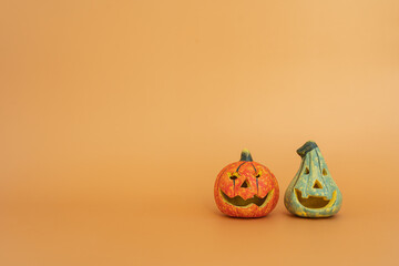 Halloween pumpkins on orange background