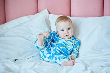 A small newborn baby boy. The concept of childhood