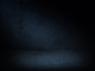 Dark blue concrete background with lighting. Urban concrete room in the dark texture. Photography studio or product display backdrop for mock up.
