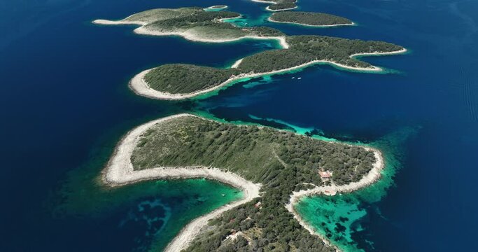Aerial footage flying over the Paklinski Islands off the coast of Croatia. Showcasing the incredible aqua blue ocean that surrounds these islands.