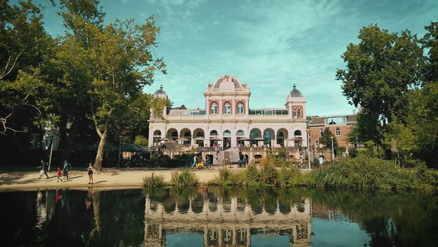 wide shot jib dutch Vondel Media Culture LAB building AVROTROS Amsterdam at pond