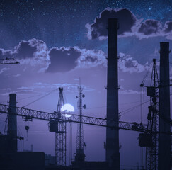 Rising of the full moon over the industrial landscape - 531000884