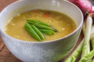 bowl of vegetable soup with vegetables
