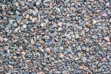 Pebbles, stones on the path, stone background, texture.