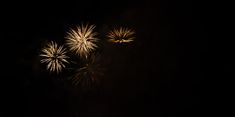 Three fireworks in night sky.Banner,copyspace.