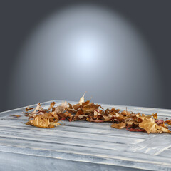 Desk of free space and autumn leaves 