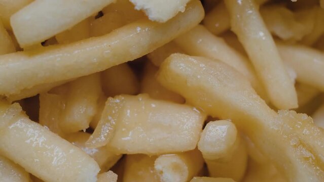Chak Chak - fried crunchy honey cake on rotating surface - top view, close up. Traditional Tatar and Bashkir cuisine, oriental dessert, gastronomy, pastry, food and Tatarstan national sweet concept