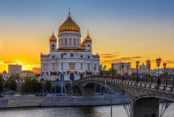 Fototapeta na wymiar Sunset view of Cathedral of Christ the Savior and Moscow river in Moscow, Russia. Architecture and landmark of Moscow