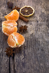 Tangerines and spices anise, lemon and cinnamon