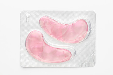 Pink hydrogel eye patches background.
