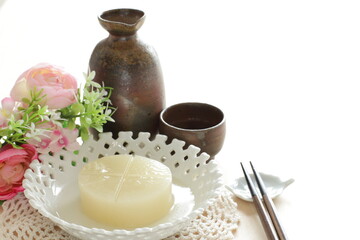 Japanese food, simmered radish for winter oden and Saki wine 