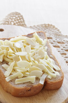 Homemade sliced almond and cheese on Walnut bread toast for nutrition breakfast image