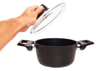 New black granite pot on gray background.