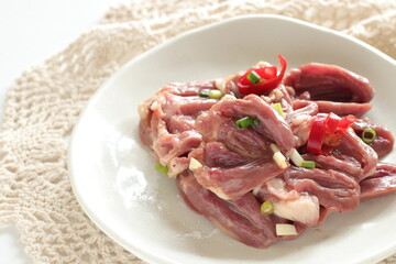 Chinese cooking, prepared Chicken heart and spring onion seasoning marinade 