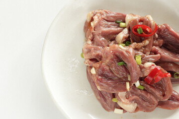 Chinese cooking, prepared Chicken heart and spring onion seasoning marinade 