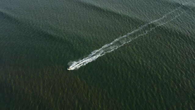 Drone shot of a speed boat moving in Cox's Bazar Sea Beach