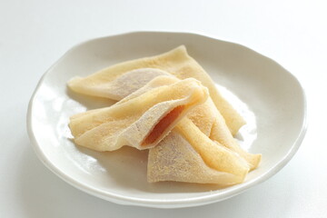 Japansese sweet food, Kyoto sweet potato paste in sticky rice in triangle shape for regional confectionery 
