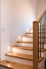 Wood staircase inside contemporary white modern house. - 531025620