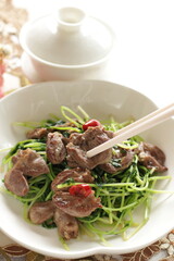 Chinese cuisine, chicken gizzard and pea sprout stir fried
